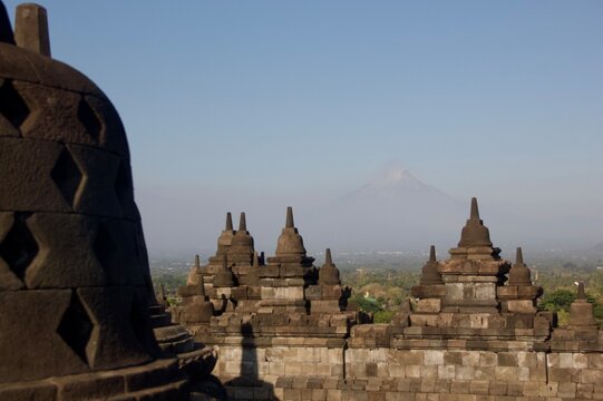 Borobudur Temple Stupas with Mount Merapi in the Background