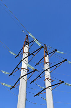 Two reinforced concrete power pole