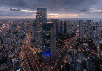 Obraz premium Tel Aviv Night Aerial Highway City Lights Skyscrapers Wide