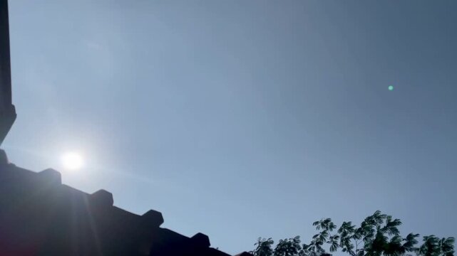 The sun beat down fiercely on the roof during the long dry season.