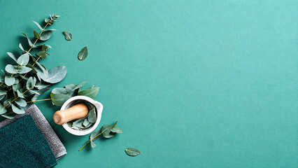 Eucalyptus Spa Wellness Background with Towels, Herbal Mortar and Copy Space © Ievgeniia Obelmaz