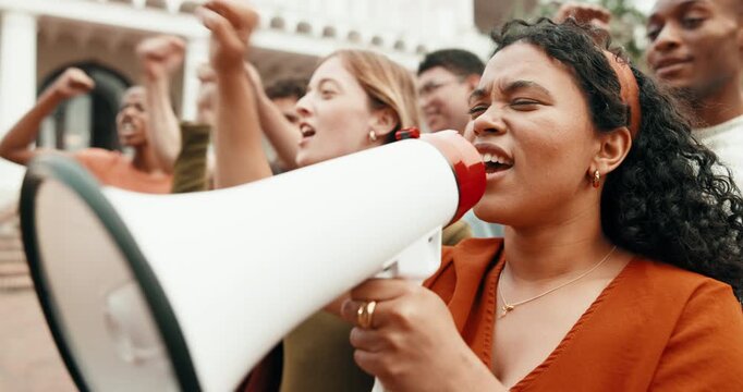 Girl, student and megaphone with protest in university for economic change or academic equality. Female person, group or crowd with bullhorn on college campus for fair education or human rights