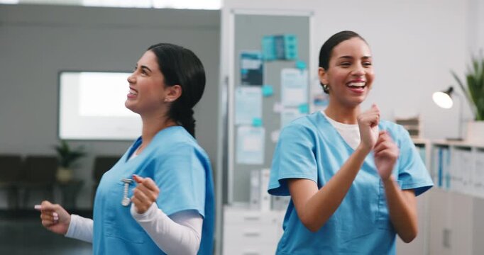 Dancing, happy and team in clinic with fun, medical achievement and celebration for shift end. Success, women and nurse with laugh, healthcare breakthrough and playful groove with completed work.