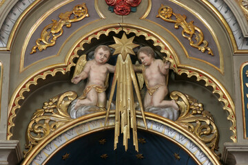 Obraz premium Angels, statue on the Altar of the Three Kings in the parish church of the Sacred Heart of Jesus in Velika Pisanica, Croatia