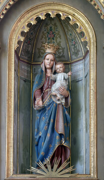 Virgin Mary with baby Jesus, statue on the altar of the Queen of the Holy Rosary in the parish church of the Sacred Heart of Jesus in Velika Pisanica, Croatia