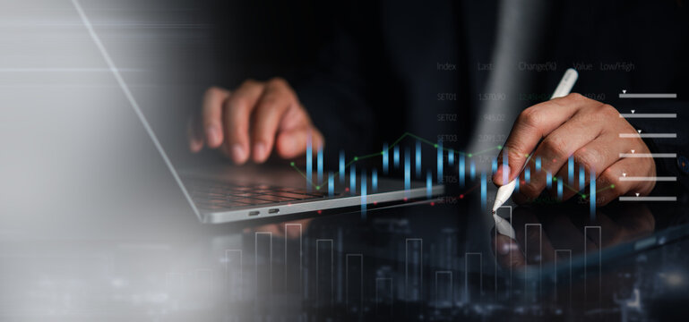Financial Data Analysis on Laptop with Market Charts and Market Trends