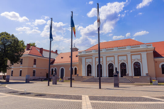 Historic public building with Romanian and European flags in Alba Iulia Transylvania Romania