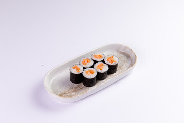 Salmon maki rolls on ceramic plate culinary arts food preparation © Игорь Соколов
