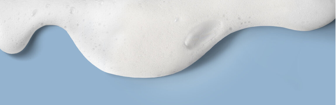 White soap foam, suds of detergent or shampoo.