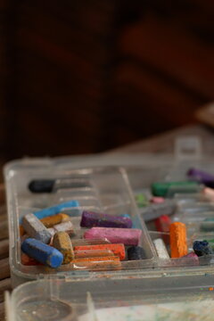Set of soft vibrant drawing chalk crayons in container