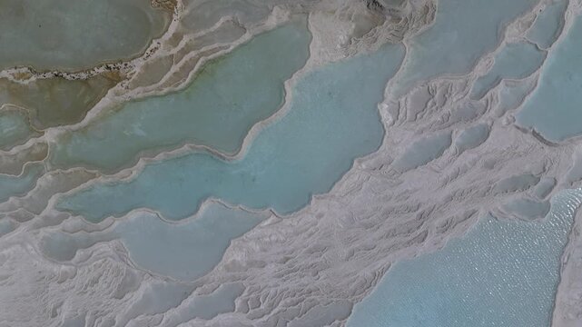 Aerial view of breathtaking natural site of white travertine thermal terraces, Pamukkale, T&uuml;rkiye	

