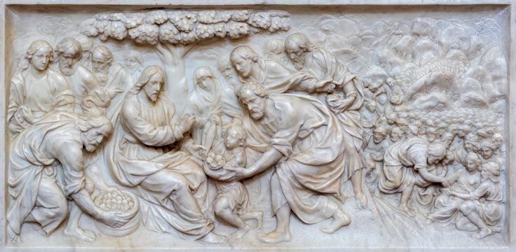 PAVIA, ITALY - SEPTEMBER 8, 2024: The detail (palioto) from marble altar - relief of Jesus among the children in the Cathedral by Tommaso Orsolino (1645 - 1650).