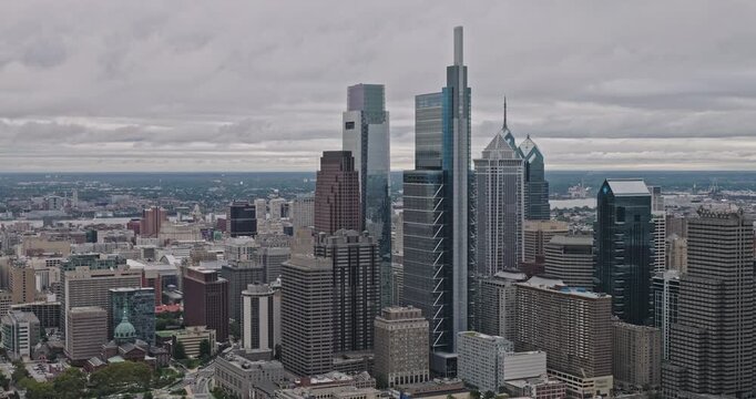Philadelphia Pennsylvania Aerial v148 flyover Logan Square in the Center city capturing downtown cityscape with towering skyscrapers under a cloudy sky - Shot with 8k Camera - Sept 29th 2023