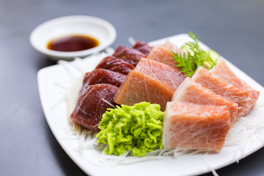 Assorted fresh raw fish sashimi platter with soy sauce bowl&nbsp;