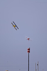 Obraz premium National Championship Air Races 9-19-2026 Roswell NM USA Bi Plane class heat race at the National Championship Air Races at the Roswell International Air Center