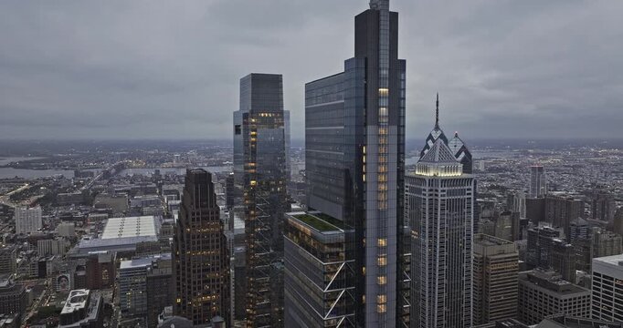 Philadelphia Pennsylvania Aerial v177 flyover around the Center City capturing downtown cityscape with towering skyscrapers under an overcast cloudy sky - Shot with 5k Camera - Sept 28th 2023
