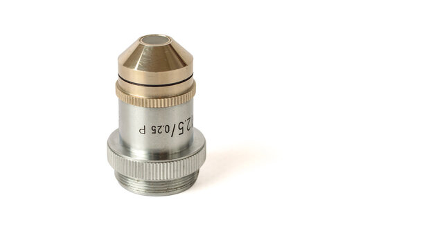 Vintage microscope objective marked Oil 12.5, with a silver metal housing, brass-colored upper section and threaded mounting base, isolated on a white background.