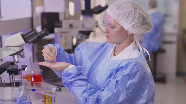 Woman, scientist and review with tablet in lab for medical research, experiment and botany. Person, online and reading report for investigation, study genetics and information for ecology innovation