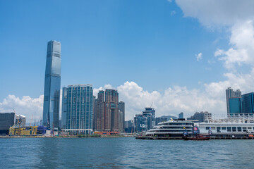 Traditional Chinese Junk Boat in Victoria Harbour with ICC © jyapa
