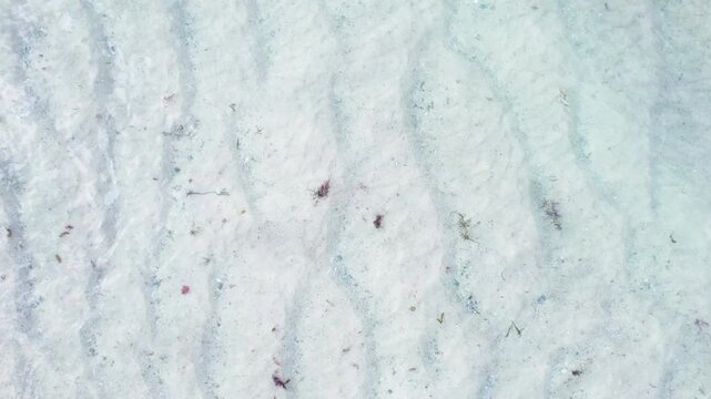 Aerial vertical takeoff over sea waves breaking on sand The Concept of rising freedom
