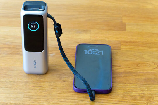 Close-up of Anker Nano Laptop Power Bank 25000 mAh, 165 W, 90 Wh power bank charging Apple iPhone 16 pro. Photo taken September 26th, 2026, Zurich, Switzerland.