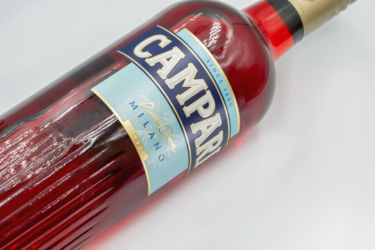 Campari bitter Italian aperitif bottle closeup on white.