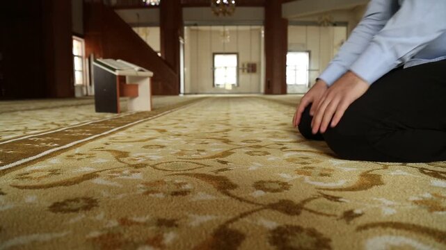 Muslim Man Bowing in Prayer Inside Peaceful Mosque