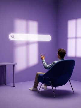 Person sitting in chair interacting with floating digital search bar