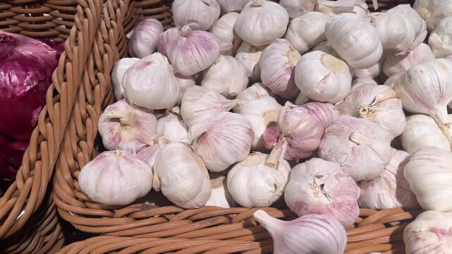 Produce Market Display &ndash; Close-Up Purple Onions and White Garlic