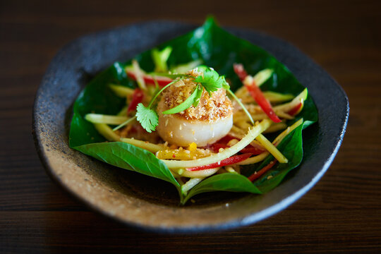 Scallot entree with salad and bettle leave fresh Vietnamese dish