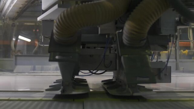 Advanced Machine Cutting Large Ceramic Slabs in Factory