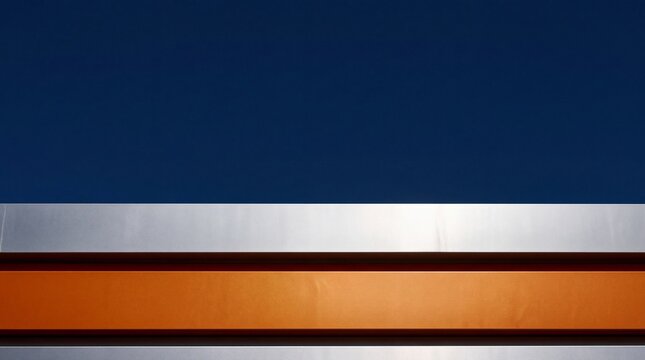Modern Architectural Facade with Orange and Silver Panels