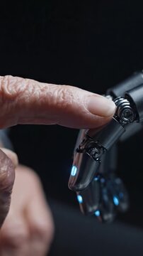 A Fascinating Interaction Between Human and Robotic Hand: Exploring the Future of Technology and Humanity's Connection with Machines