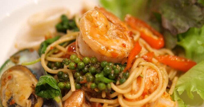 Close up of spicy seafood spaghetti Thai fusion food