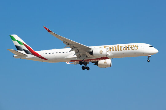 Emirates Airbus A350-900 (A6-EXI) landing at Dubai International Airport on November 23, 2025 in Dubai, UAE