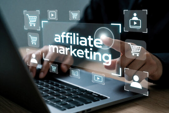 Businessman works on laptop with digital hologram showing affiliate marketing text, shopping cart icons. Online entrepreneur touches virtual screen to boost sales, passive income. Digital advertising