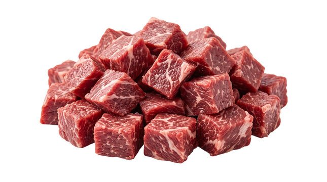 Pile of raw beef cubes isolated on a black background for culinary and butcher shop use