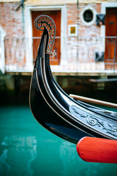 Gondola resting quietly on the serene waters of the Grand Canal