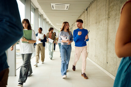 Group of Students Walking in a Corridor