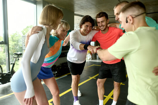 Fitness Team Huddle Before Group Workout