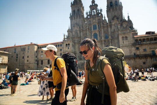 Pilgrims wander the busy plaza
