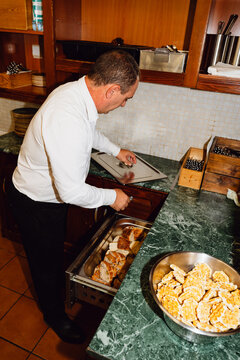 Placing bread in warmer
