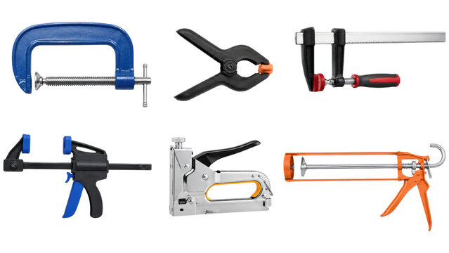 Six different hand clamps and fastening tools arranged on transparent background, including C-clamp, spring clamp, bar clamps, trigger clamp, staple gun and caulking gun for carpentry and DIY projects