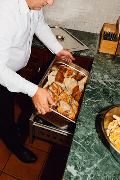 Placing bread in warmer