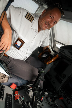 Pilot in Aircraft Cockpit