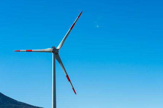 Wind Turbine Against Blue Sky