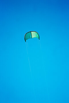 Kitesurfing Kite Flying in Blue Sky