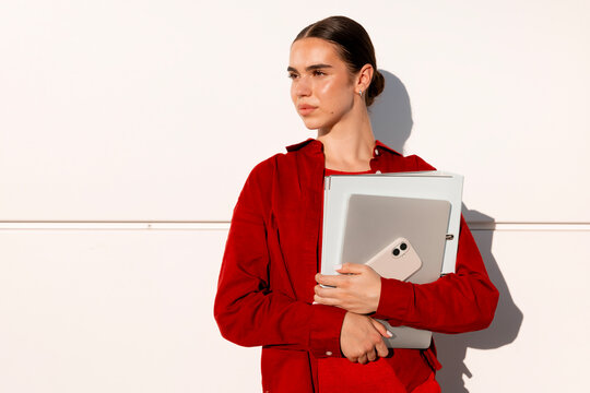 Woman ready for mobile work with laptop and smartphone