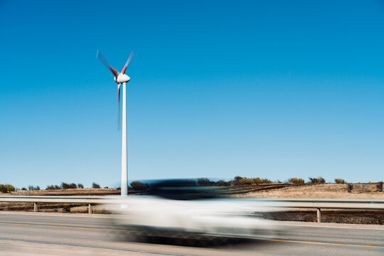 Speeding Car Past Turbine