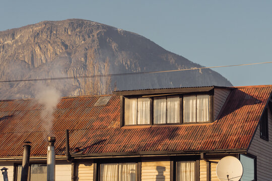 Rusted Roof Below Mountain Coyhaique